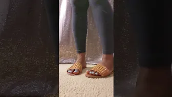 Beautiful Ebony feet tries on spikey pandals