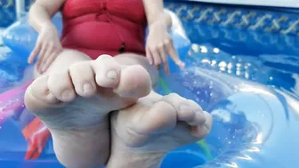 wife's feet in the pool #3