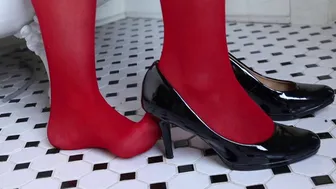 Taking Off Black Patten Leather High Heels Revealing Red Panty Hose Underneath