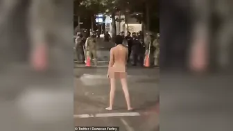 Naked Athena' strips off dares police to shoot tear gas during stand-off in 'Battle of Portland' #4