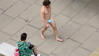 Man turns facemask into G-string for walkabout through downtown London