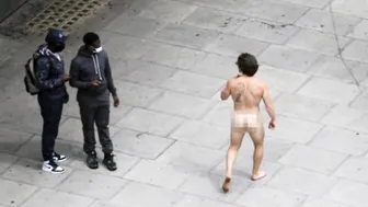 Man turns facemask into G-string for walkabout through downtown London #4