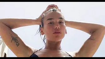 Dua Lipa unleashes booty and boobs as she slips into teeny string thong bikini №2