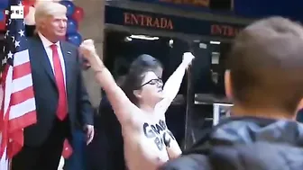 Feminist activist flashes breasts as protest against Trump in Madrid || viral nation 2m #3