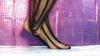 Woman Modeling Striped Fishnet Stockings #4